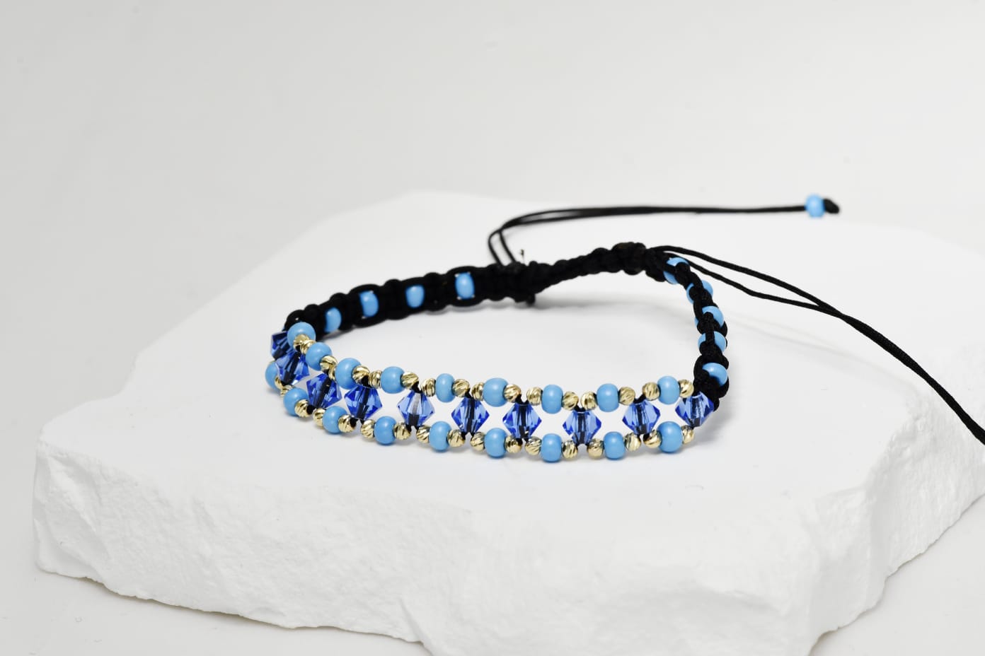 14K Gold and Blue Crystal Bracelet – Black Cord