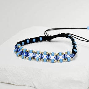 14K Gold and Blue Crystal Bracelet – Black Cord