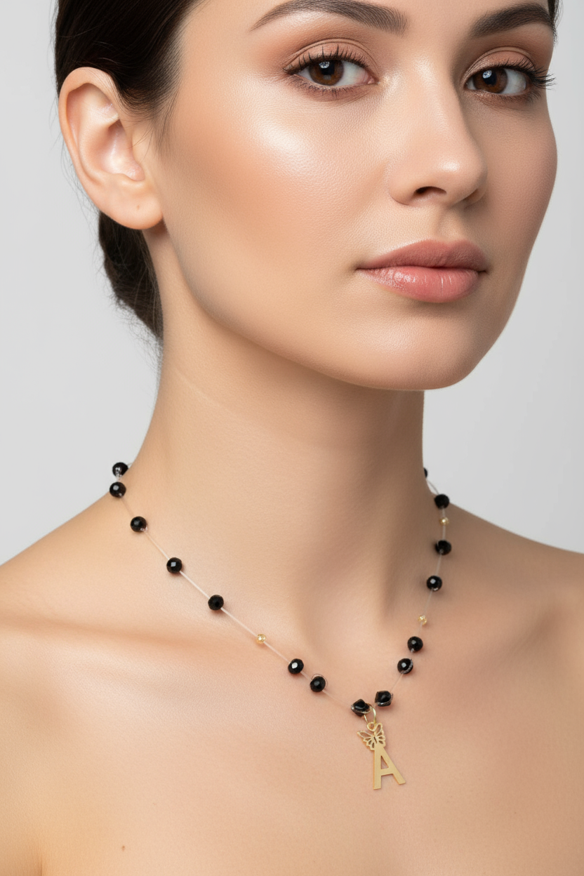 Necklace with Faceted Black Crystal Beads and “A” Initial Pendant