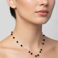 Necklace with Faceted Black Crystal Beads and “A” Initial Pendant