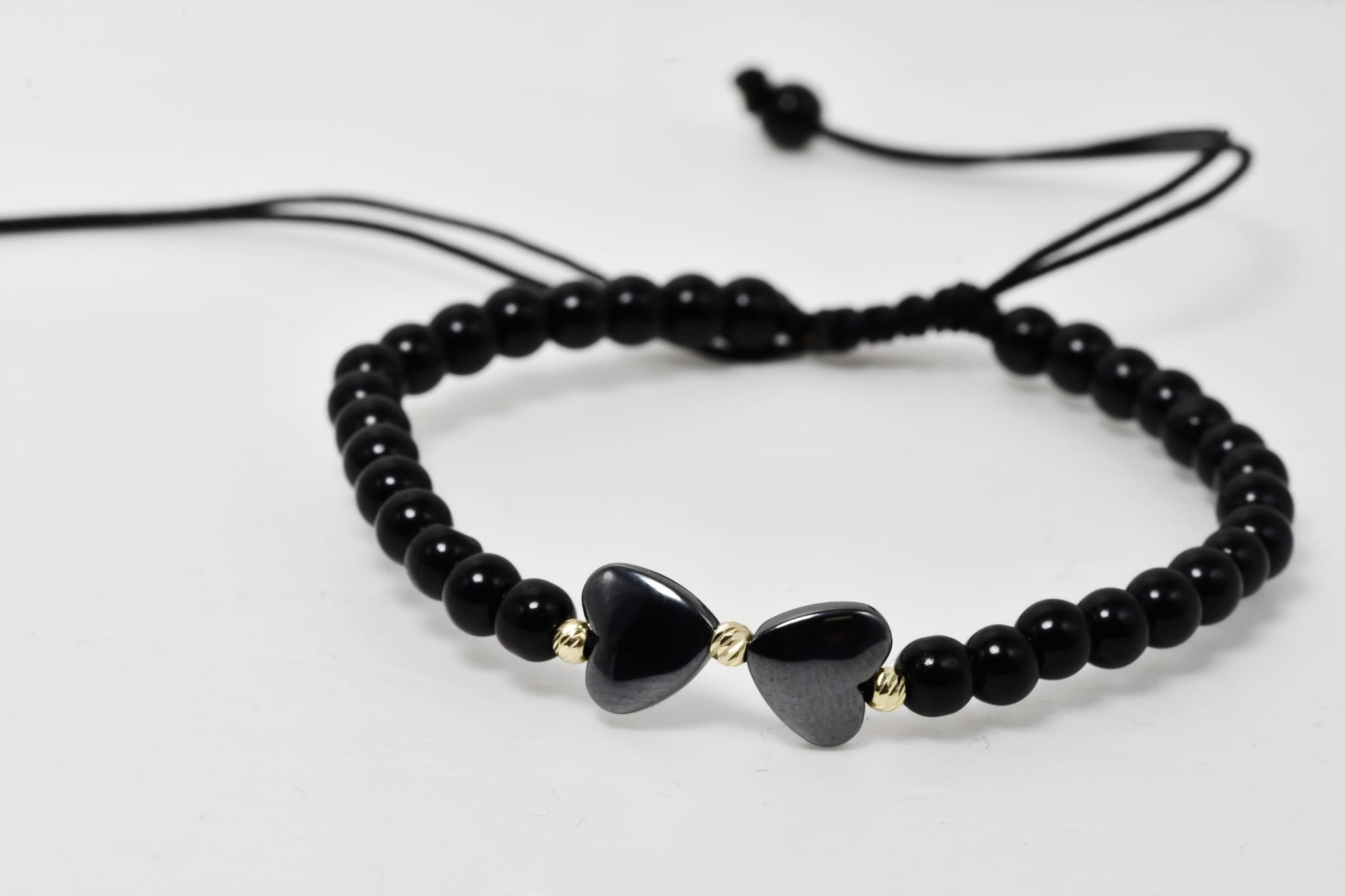 Black Beaded Bracelet with Double Heart Detail and 14K Gold Accents