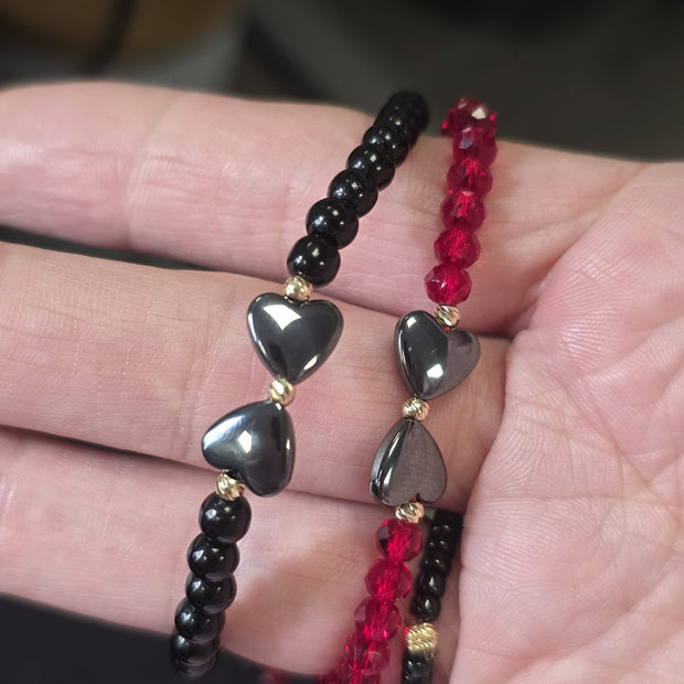 Black Beaded Bracelet with Double Heart Detail and 14K Gold Accents