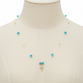 Blue Crystal Cross Necklace – 14K Gold