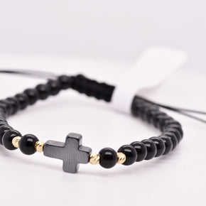 Black Cross Bracelet with Gold Accents