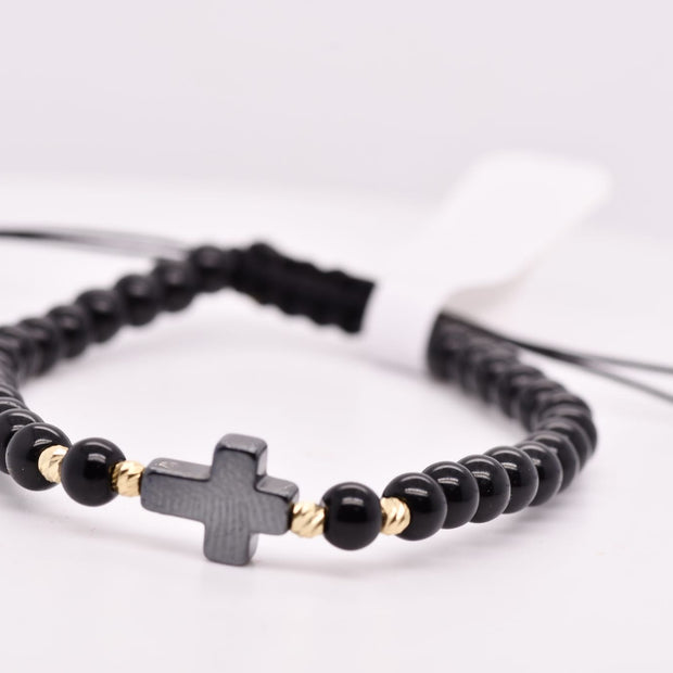 Black Cross Bracelet with Gold Accents