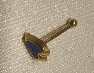 Polished 14K gold nose pierce by Karina's Diamond